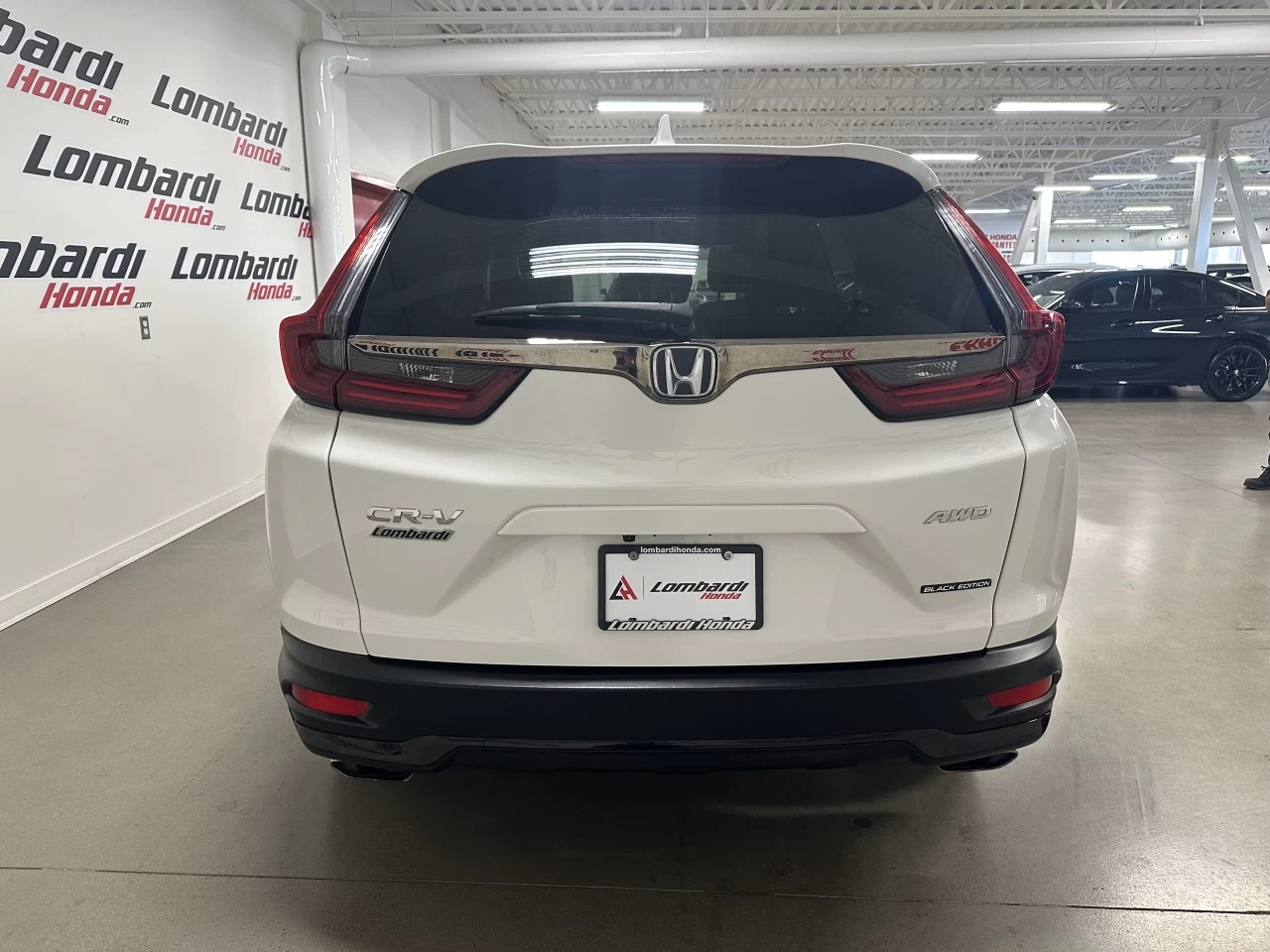 2022 Honda CR-V
                                                    Touring/Black Edition Image principale