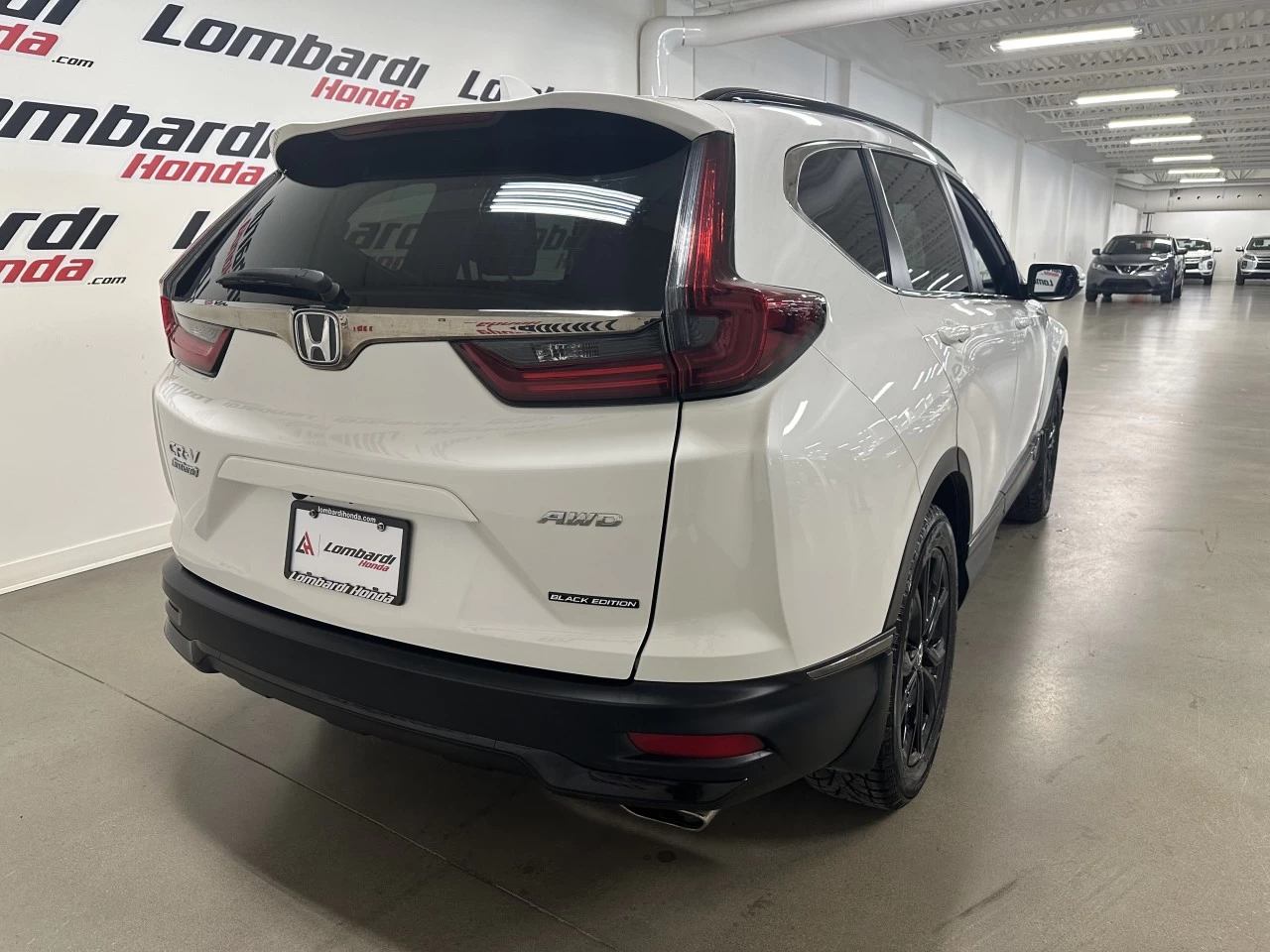 2022 Honda CR-V
                                                    Touring/Black Edition Image principale