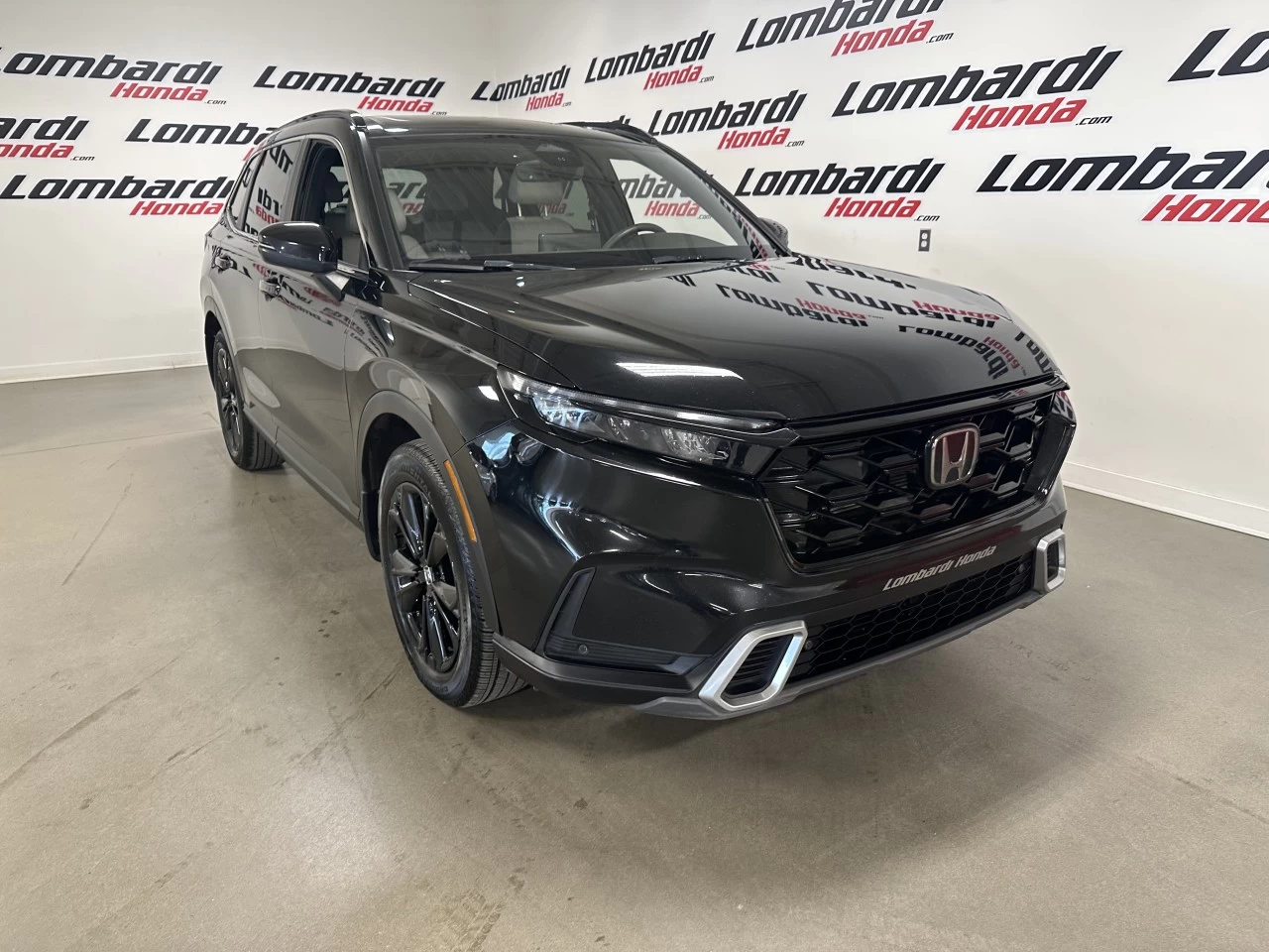 2024 Honda CR-V hybride Touring https://www.lombardihonda.com/resize/b990ff35b810a3abc0cc817b2ca24889-1