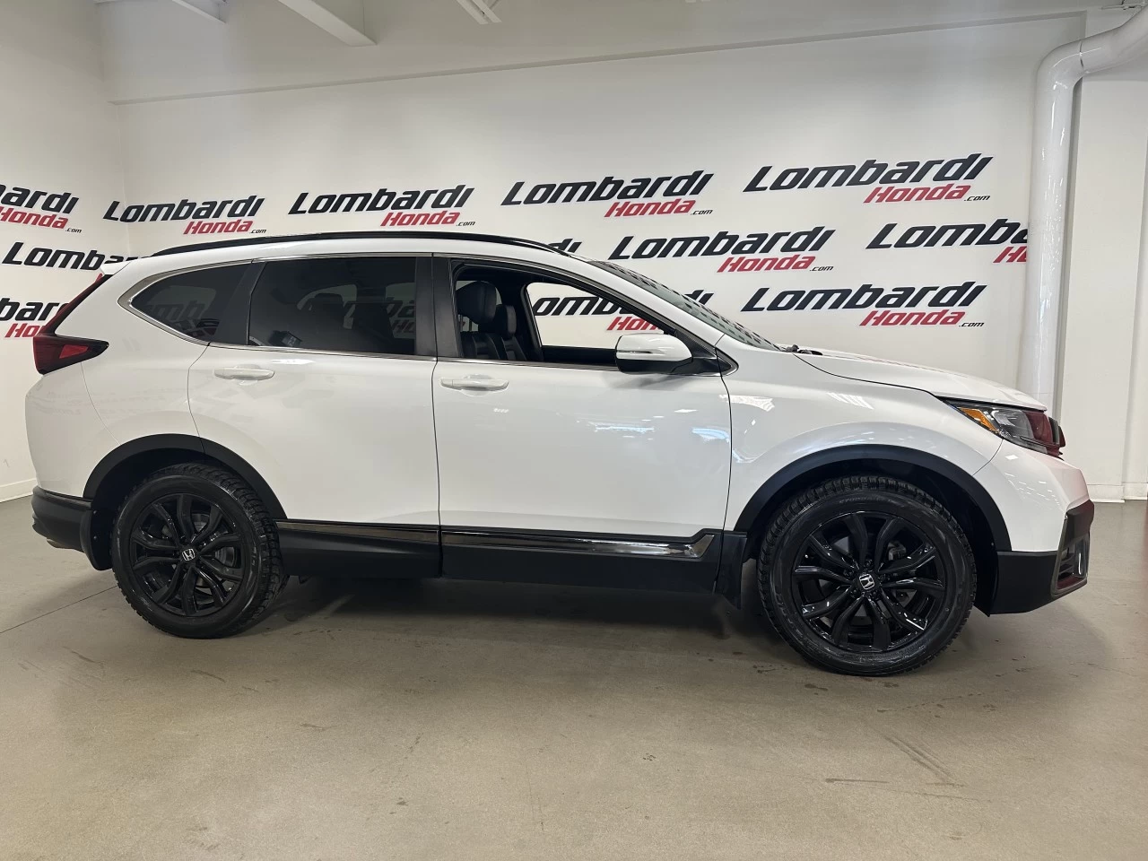 2022 Honda CR-V
                                                    Touring/Black Edition Image principale