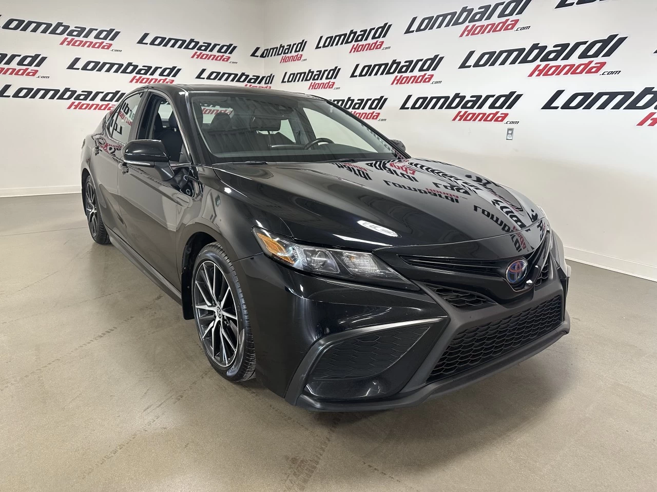 2023 Toyota Camry Hybrid https://www.lombardihonda.com/resize/b990ff35b810a3abc0cc817b2ca24889-1