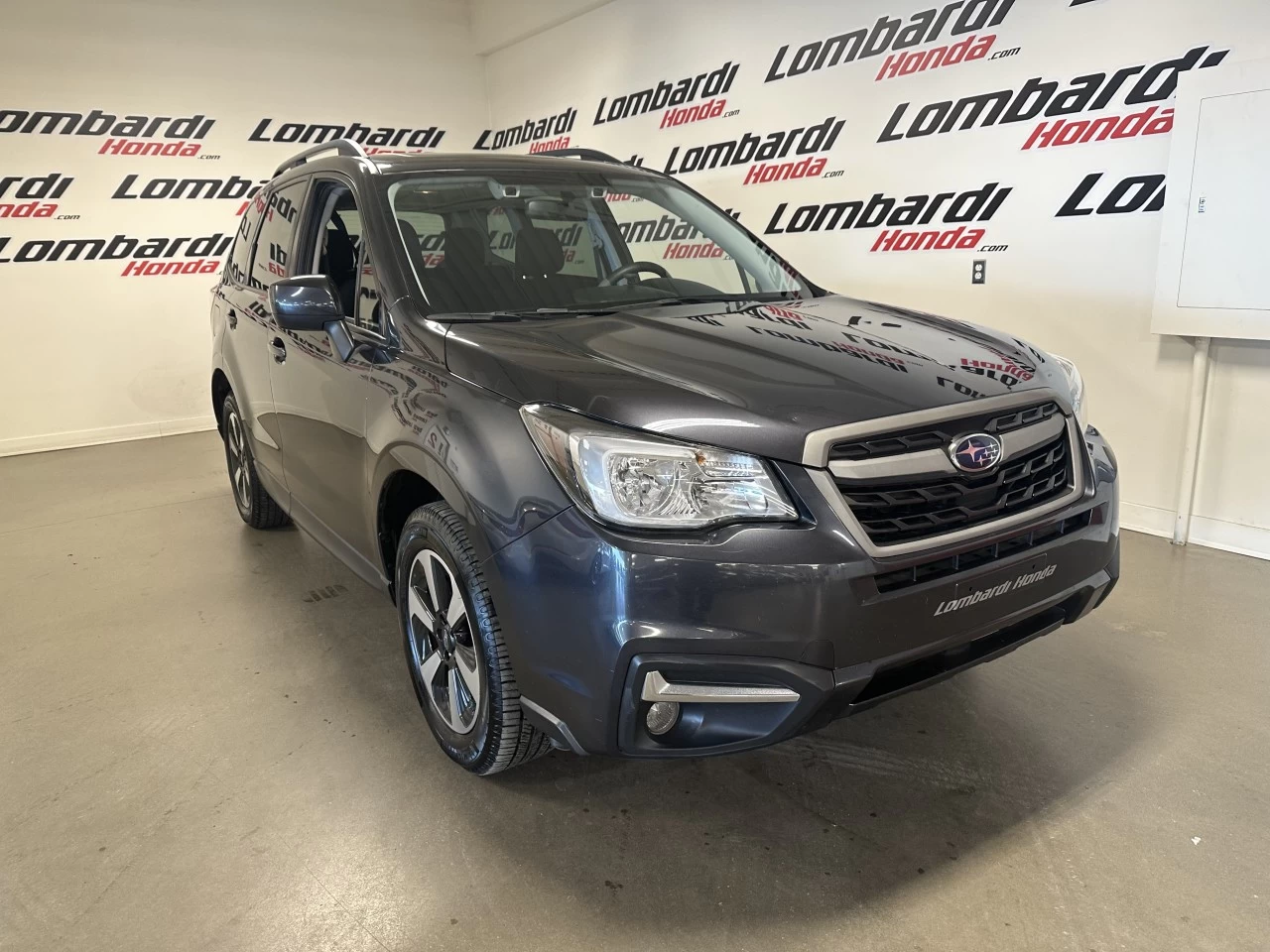 2018 Subaru Forester Touring https://www.lombardihonda.com/resize/b990ff35b810a3abc0cc817b2ca24889-1