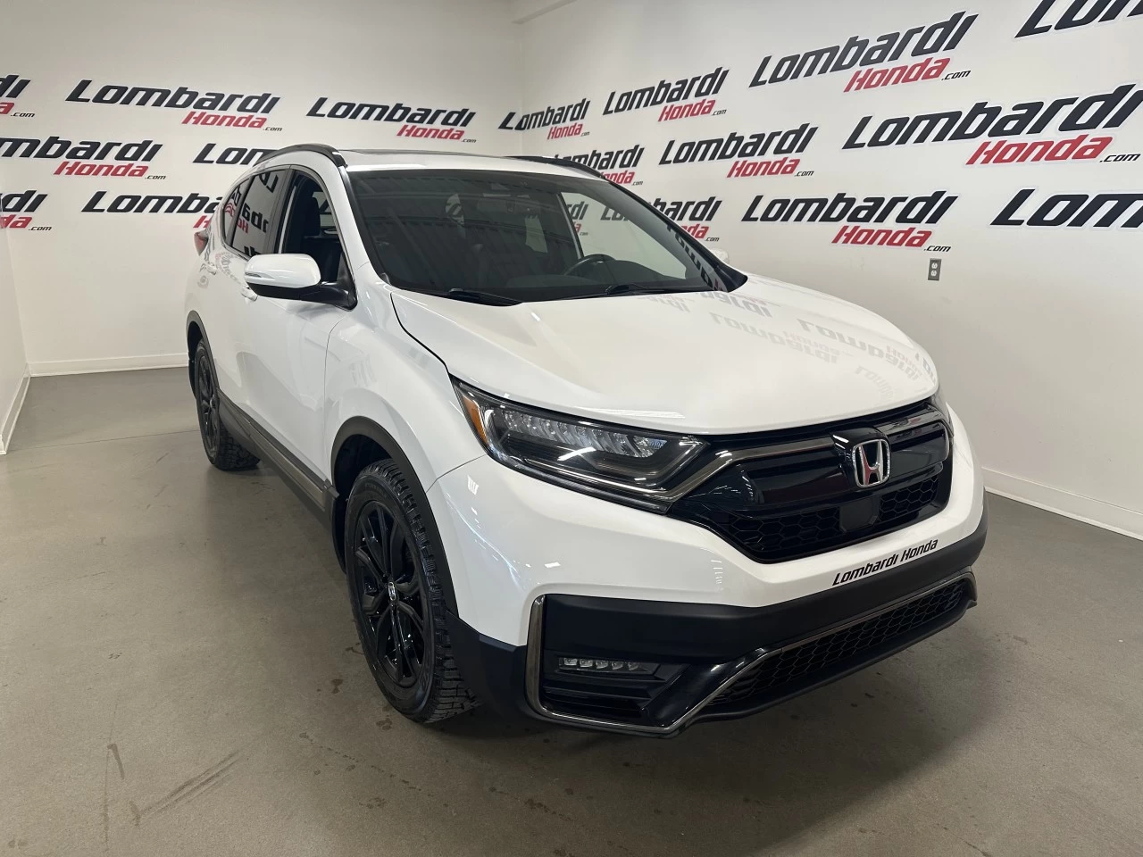 2022 Honda CR-V
                                                    Touring/Black Edition Image principale