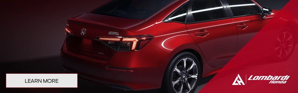 rear view of a red Honda Civic at night with a call to action read more