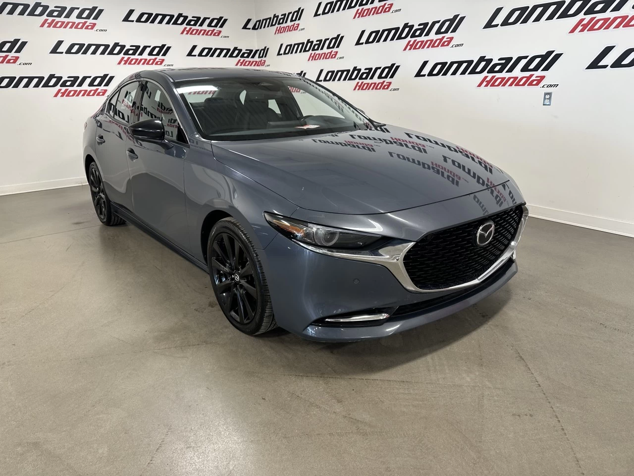 2024 Mazda 3 Sport GT w/Turbo https://www.lombardihonda.com/resize/b990ff35b810a3abc0cc817b2ca24889-1