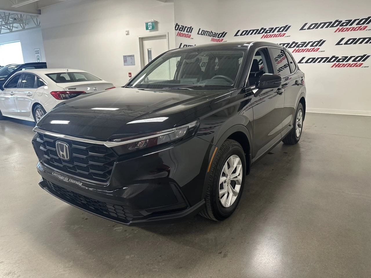 2025 Honda CR-V LX https://www.lombardihonda.com/resize/b990ff35b810a3abc0cc817b2ca24889-1