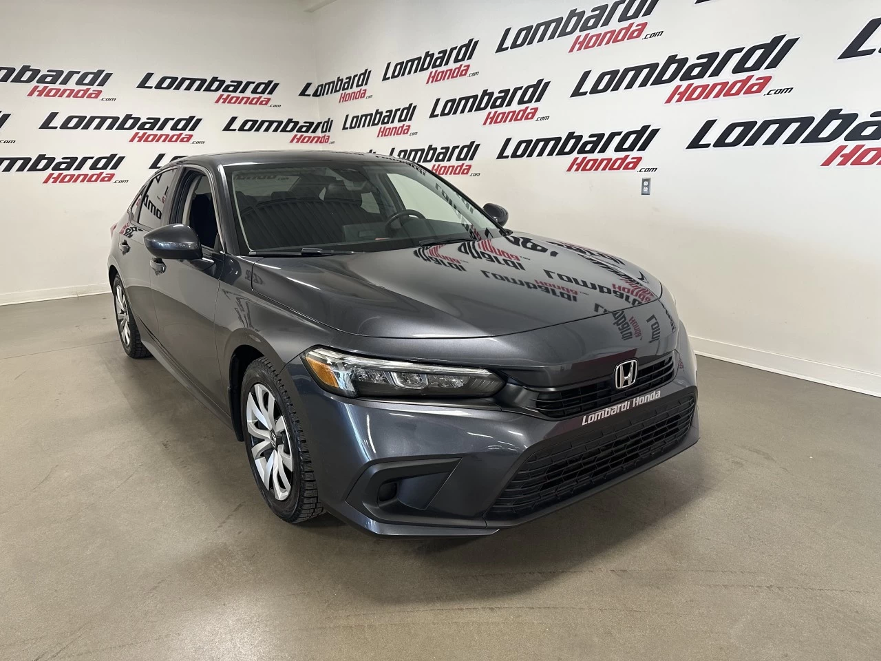 2023 Honda Civic LX https://www.lombardihonda.com/resize/b990ff35b810a3abc0cc817b2ca24889-1
