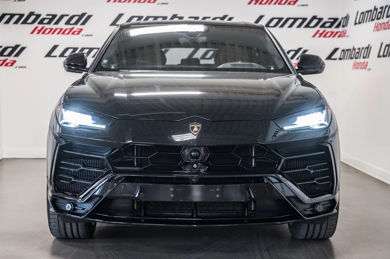 2019 Lamborghini Urus  https://www.lombardihonda.com/resize/b990ff35b810a3abc0cc817b2ca24889-1