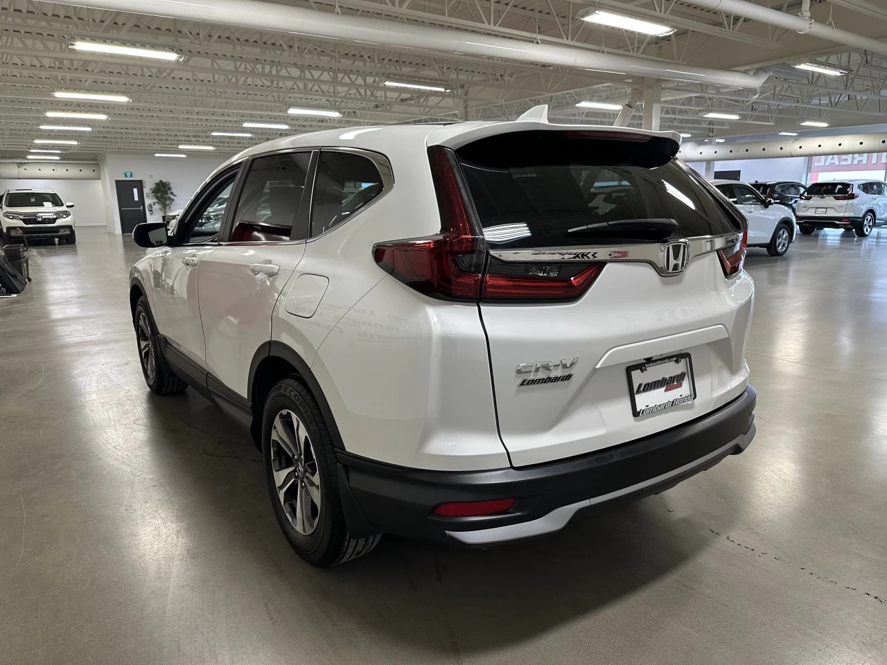 2021 Honda CR-V LX https://www.lombardihonda.com/resize/b990ff35b810a3abc0cc817b2ca24889-1