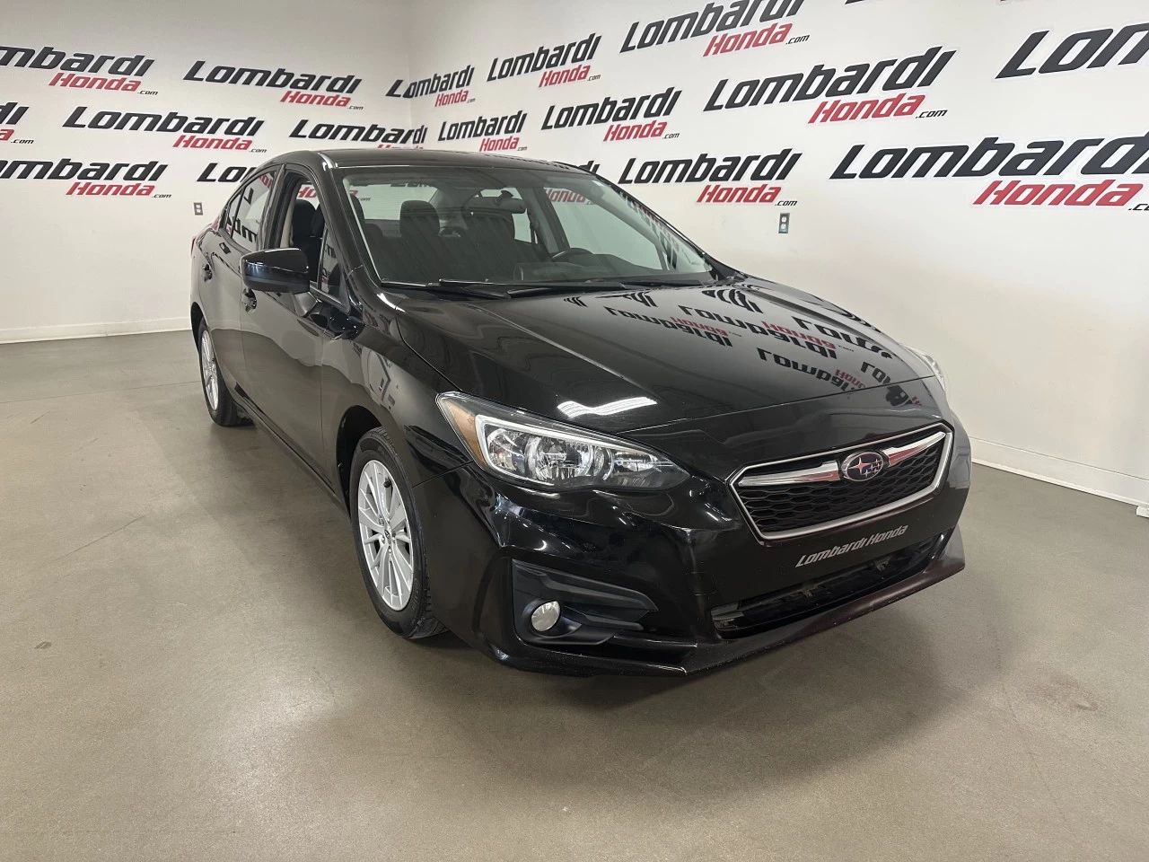 2017 Subaru Impreza
                                                    Touring Image principale