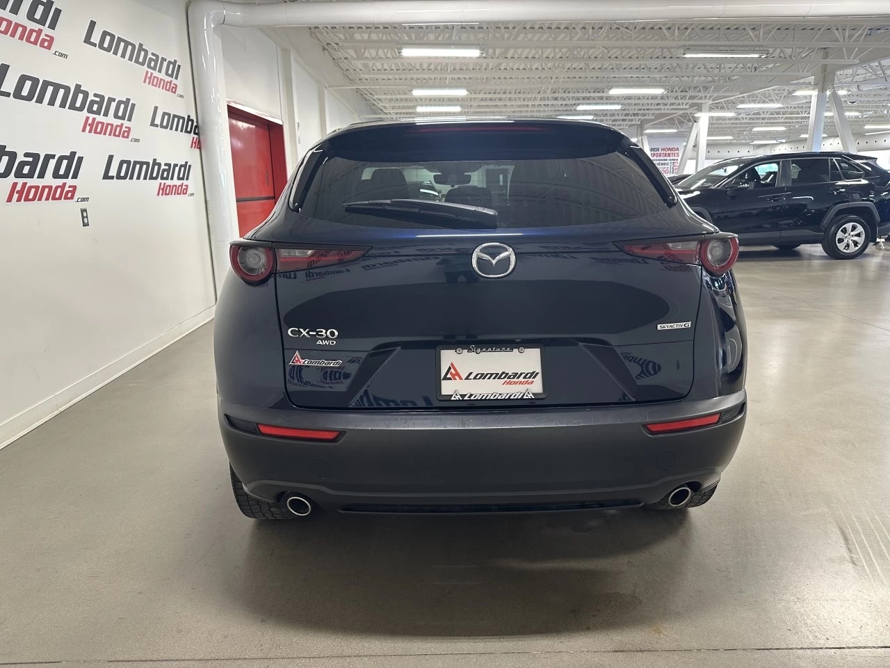 2022 Mazda CX-30 GS https://www.lombardihonda.com/resize/b990ff35b810a3abc0cc817b2ca24889-1