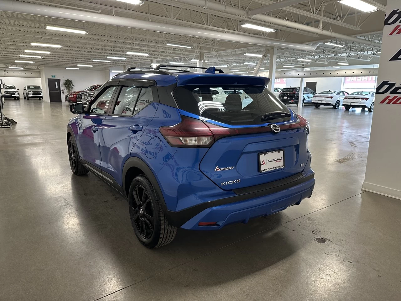2021 Nissan Kicks SR https://www.lombardihonda.com/resize/b990ff35b810a3abc0cc817b2ca24889-1
