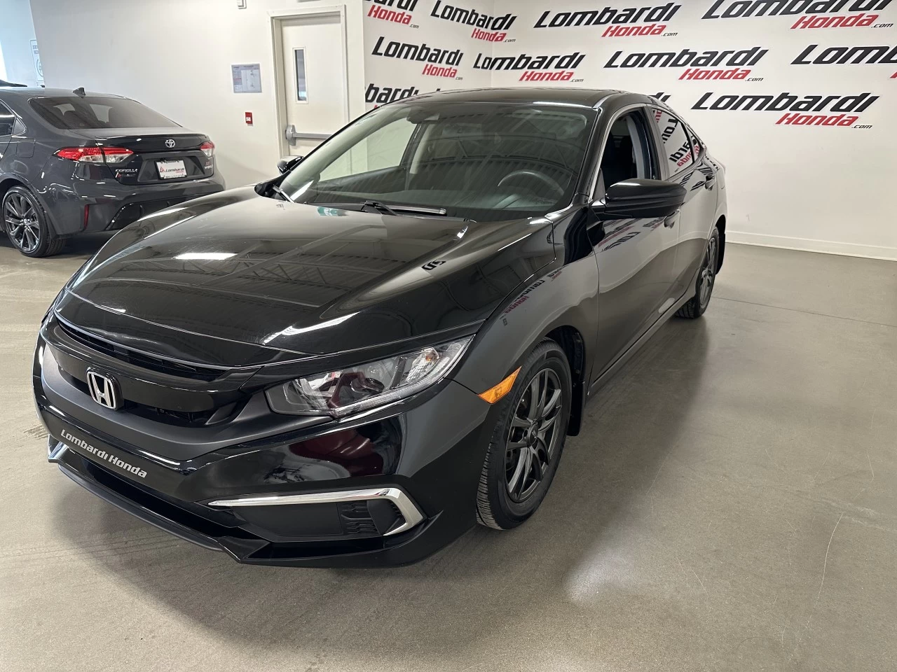 2020 Honda Civic LX https://www.lombardihonda.com/resize/b990ff35b810a3abc0cc817b2ca24889-1