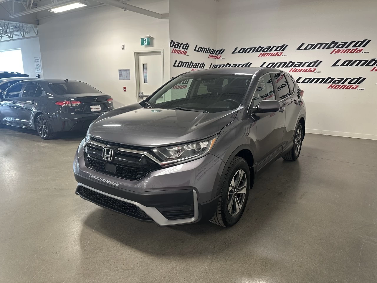2020 Honda CR-V LX https://www.lombardihonda.com/resize/b990ff35b810a3abc0cc817b2ca24889-1