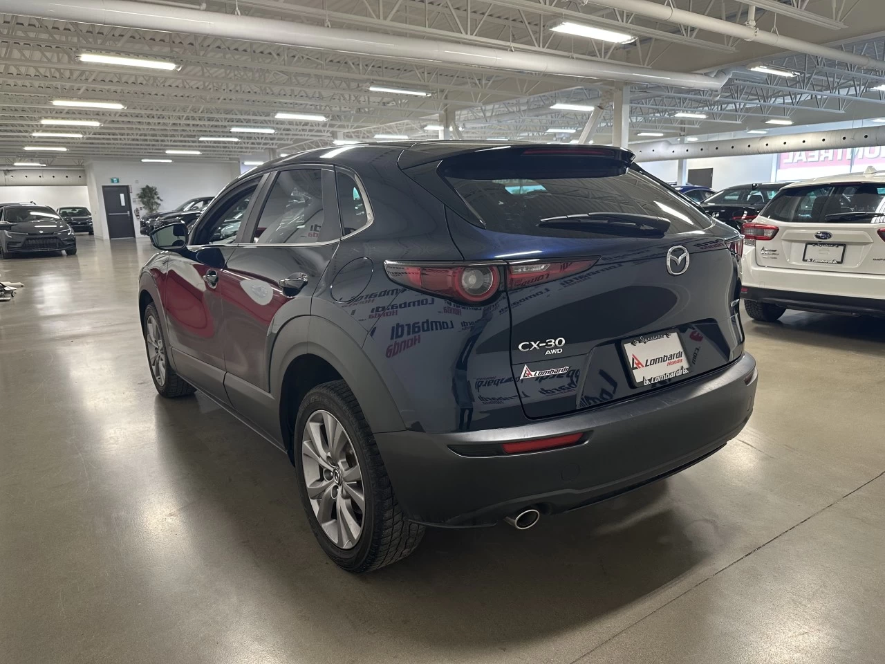 2022 Mazda CX-30 GS https://www.lombardihonda.com/resize/b990ff35b810a3abc0cc817b2ca24889-1