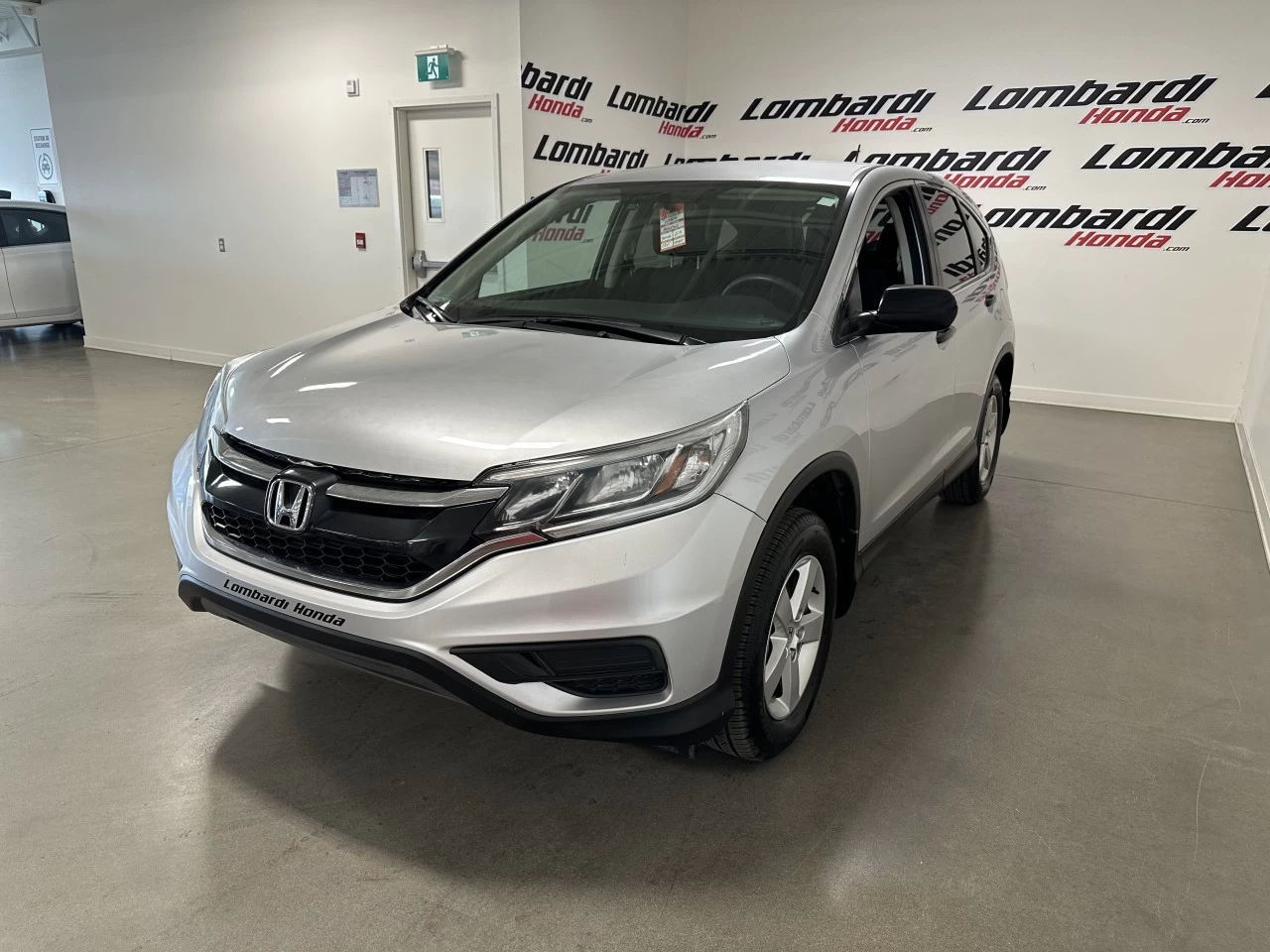 2015 Honda CR-V LX https://www.lombardihonda.com/resize/b990ff35b810a3abc0cc817b2ca24889-1