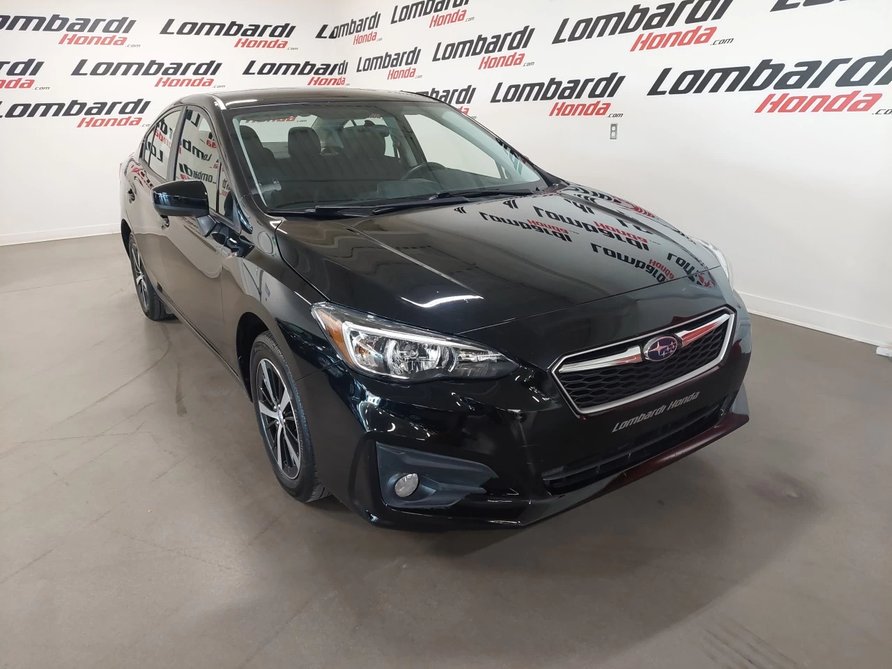 2019 Subaru Impreza
                                                    Touring Image principale