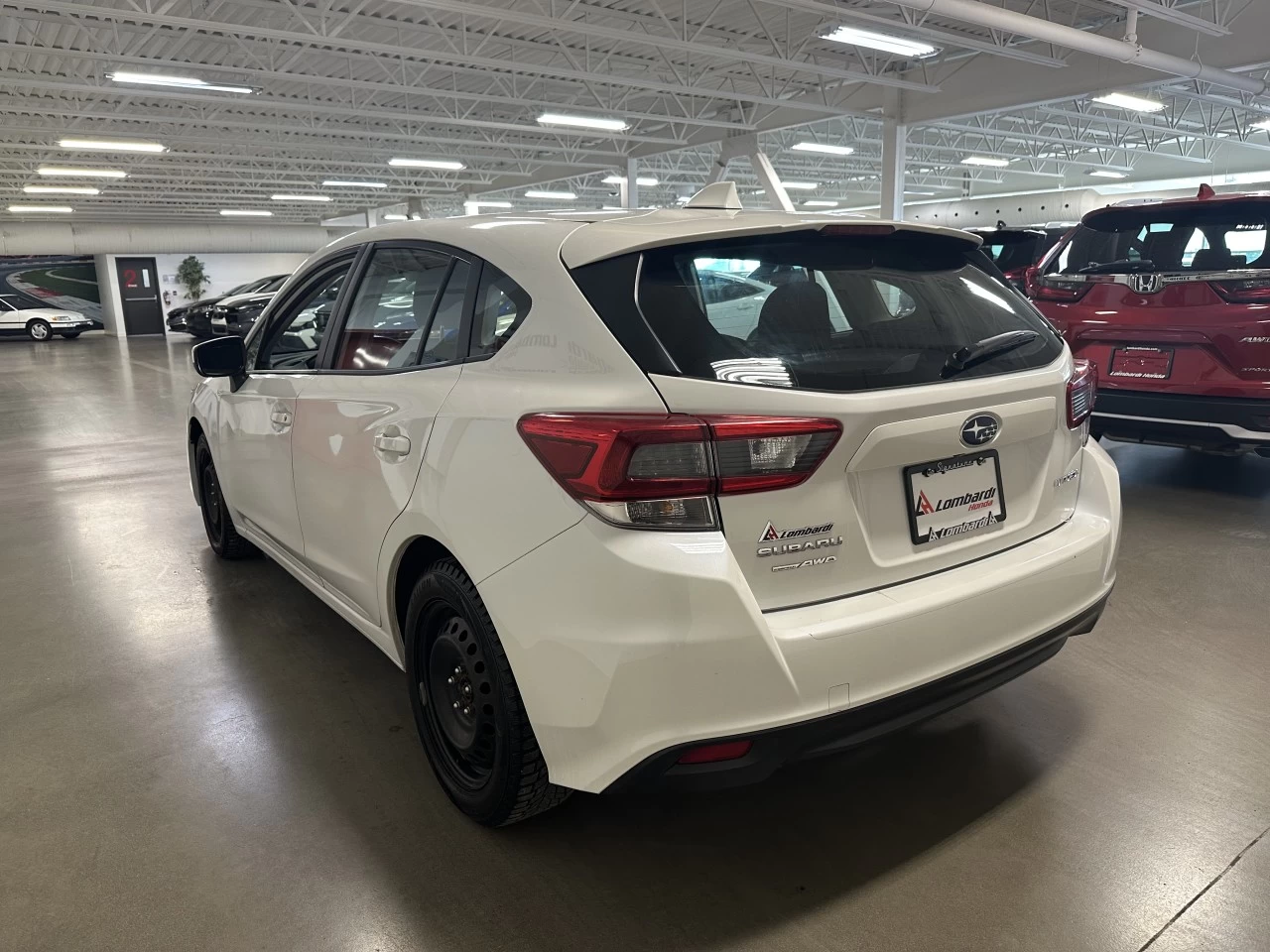 2022 Subaru Impreza
                                                    Touring Image principale