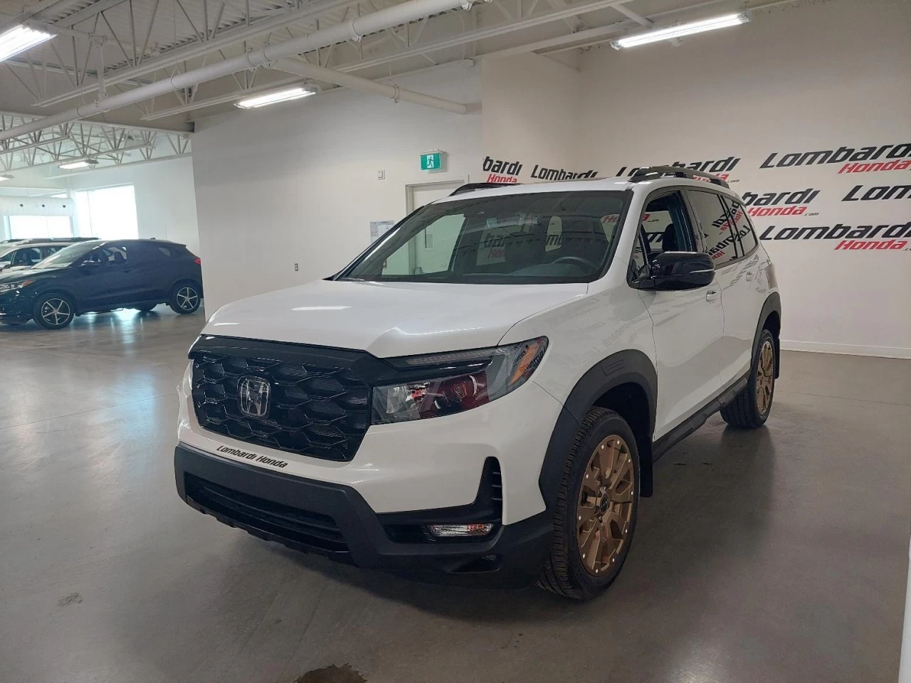 2022 Honda Passport
                                                    TOURING Image principale