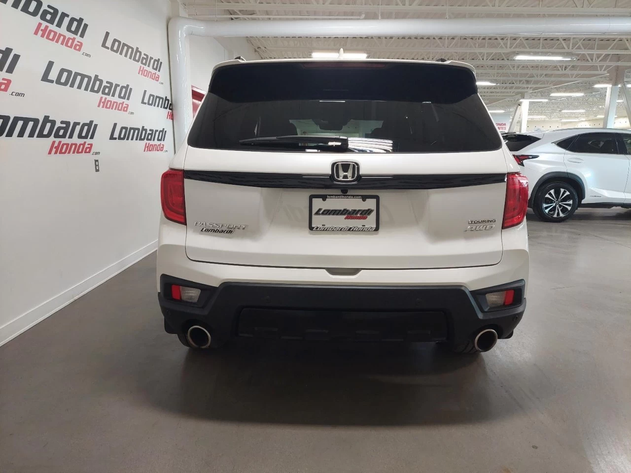 2022 Honda Passport
                                                    TOURING Image principale