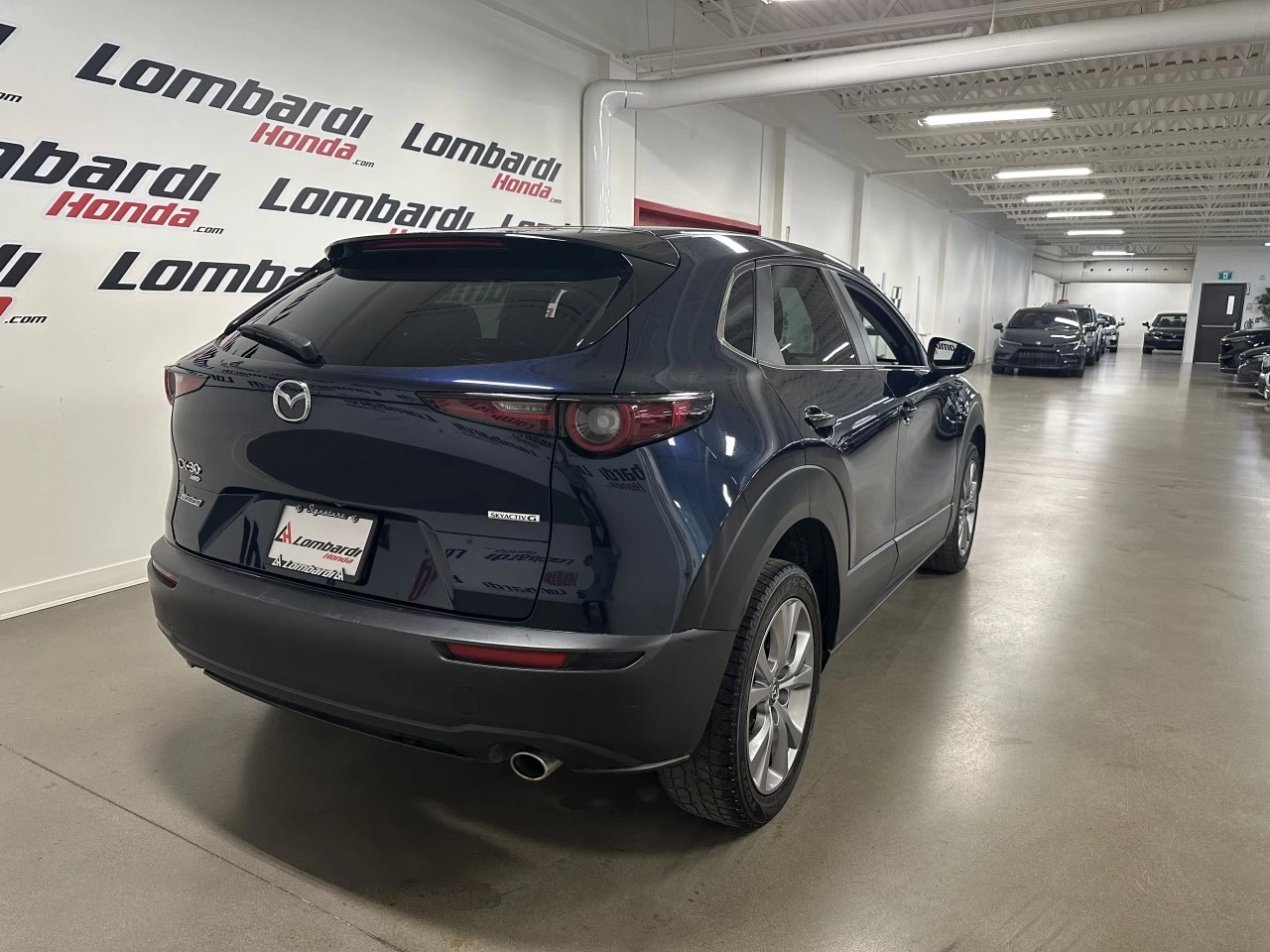 2022 Mazda CX-30 GS https://www.lombardihonda.com/resize/b990ff35b810a3abc0cc817b2ca24889-1