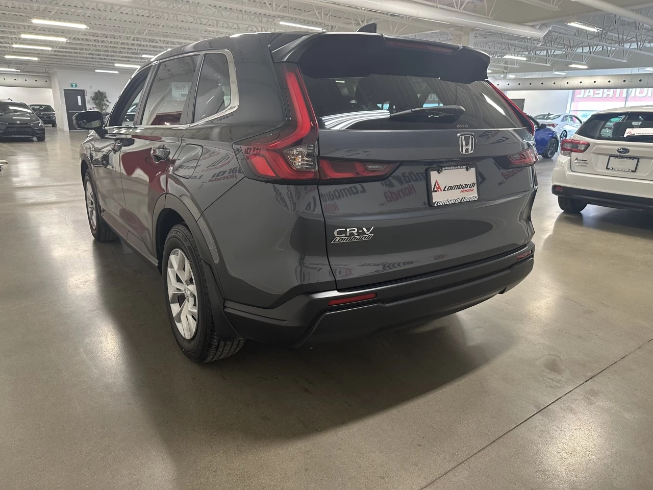 2023 Honda CR-V LX https://www.lombardihonda.com/resize/b990ff35b810a3abc0cc817b2ca24889-1