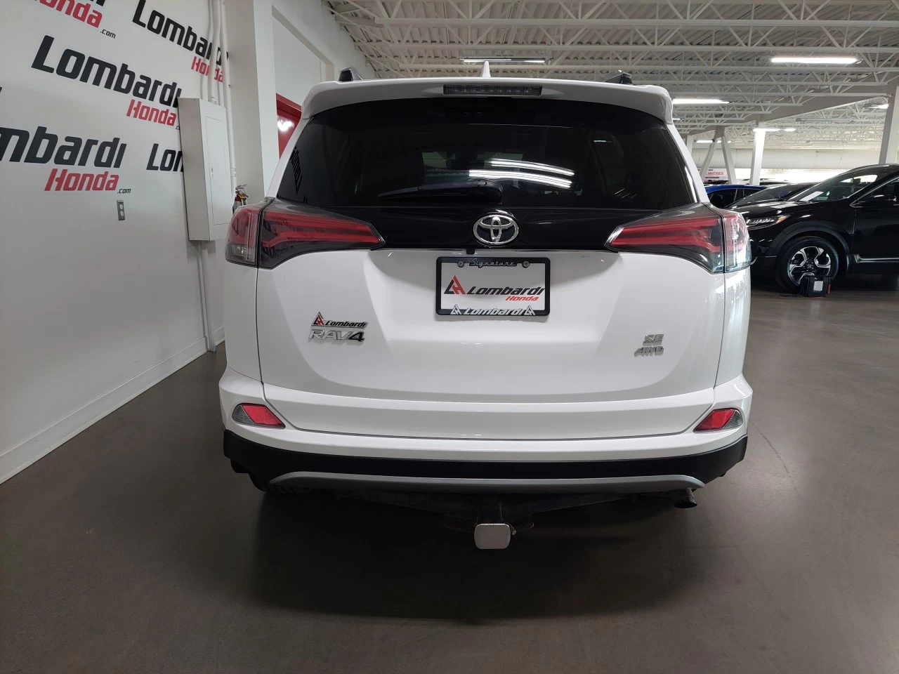 2018 Toyota RAV4 SE AWD https://www.lombardihonda.com/resize/b990ff35b810a3abc0cc817b2ca24889-1