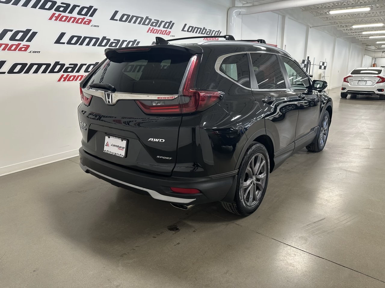 2021 Honda CR-V Sport https://www.lombardihonda.com/resize/b990ff35b810a3abc0cc817b2ca24889-1