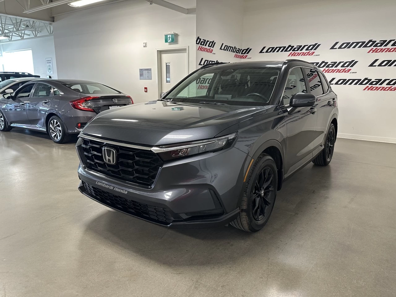 2023 Honda CR-V Sport/Sport-B https://www.lombardihonda.com/resize/b990ff35b810a3abc0cc817b2ca24889-1