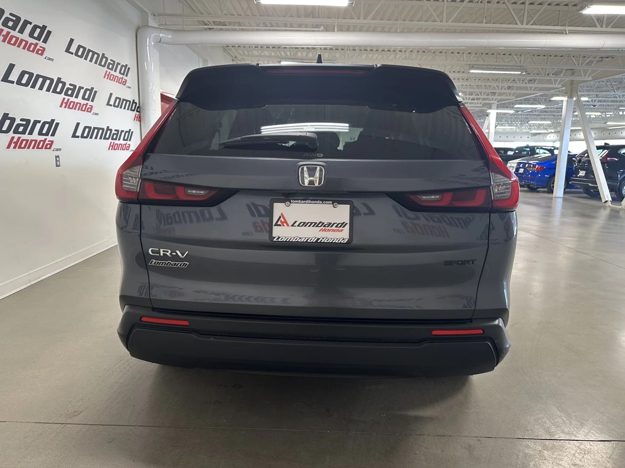 2024 Honda CR-V Sport https://www.lombardihonda.com/resize/b990ff35b810a3abc0cc817b2ca24889-1
