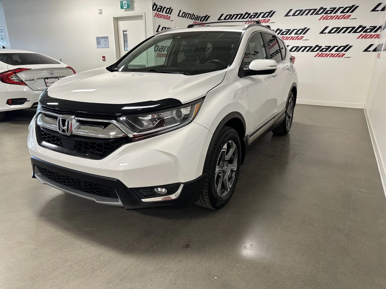 2019 Honda CR-V EX-L https://www.lombardihonda.com/resize/b990ff35b810a3abc0cc817b2ca24889-1