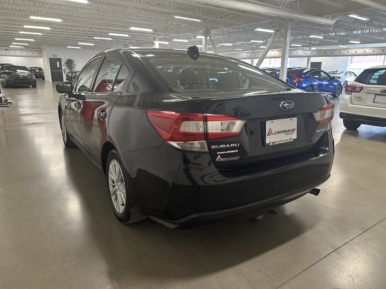 2017 Subaru Impreza
                                                    Touring Image principale