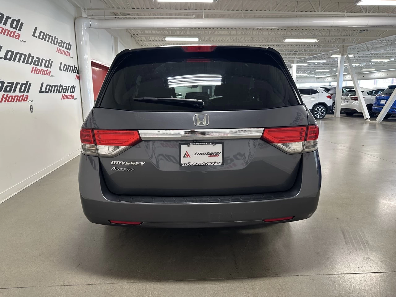 2016 Honda Odyssey EX https://www.lombardihonda.com/resize/b990ff35b810a3abc0cc817b2ca24889-1