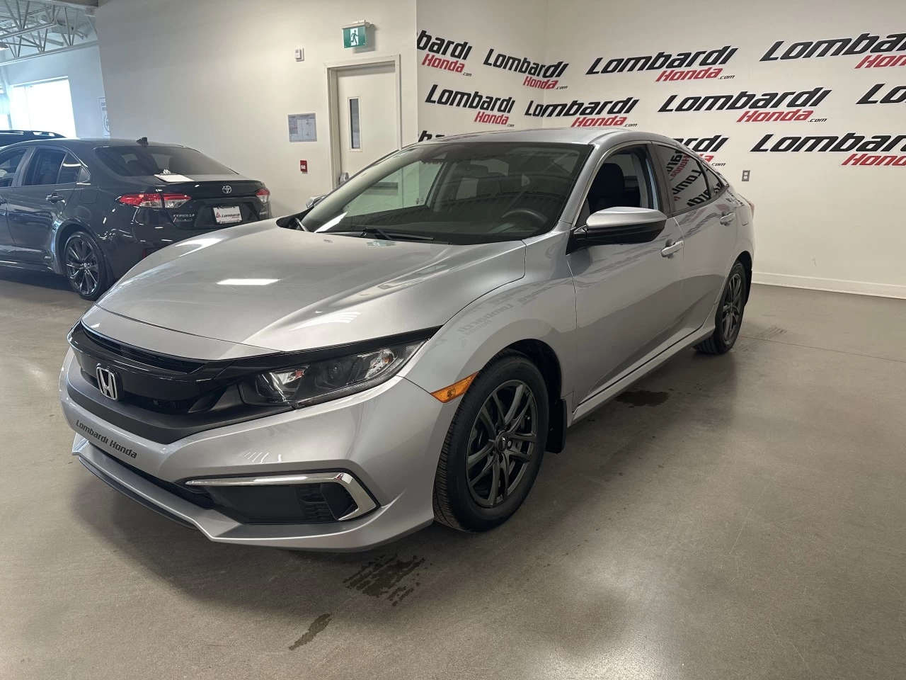 2020 Honda Civic LX https://www.lombardihonda.com/resize/b990ff35b810a3abc0cc817b2ca24889-1