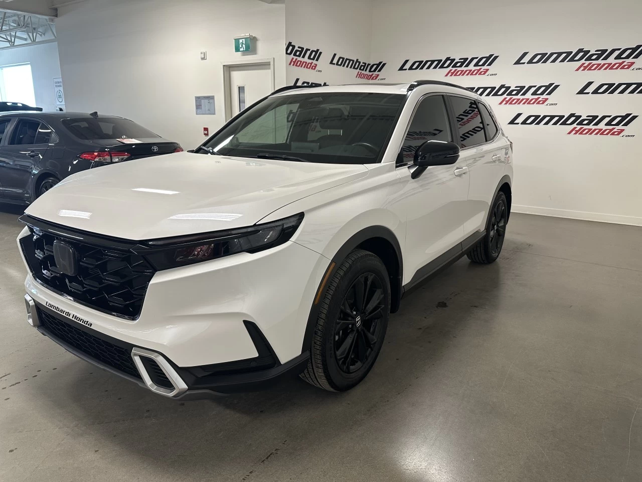 2023 Honda CR-V Touring https://www.lombardihonda.com/resize/b990ff35b810a3abc0cc817b2ca24889-1