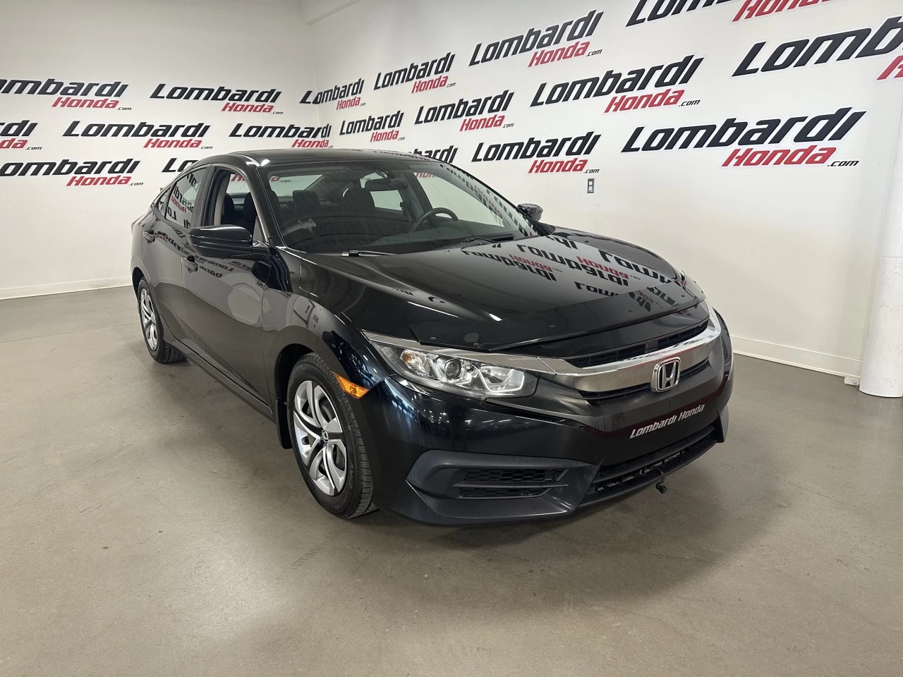 2016 Honda Civic LX https://www.lombardihonda.com/resize/b990ff35b810a3abc0cc817b2ca24889-1