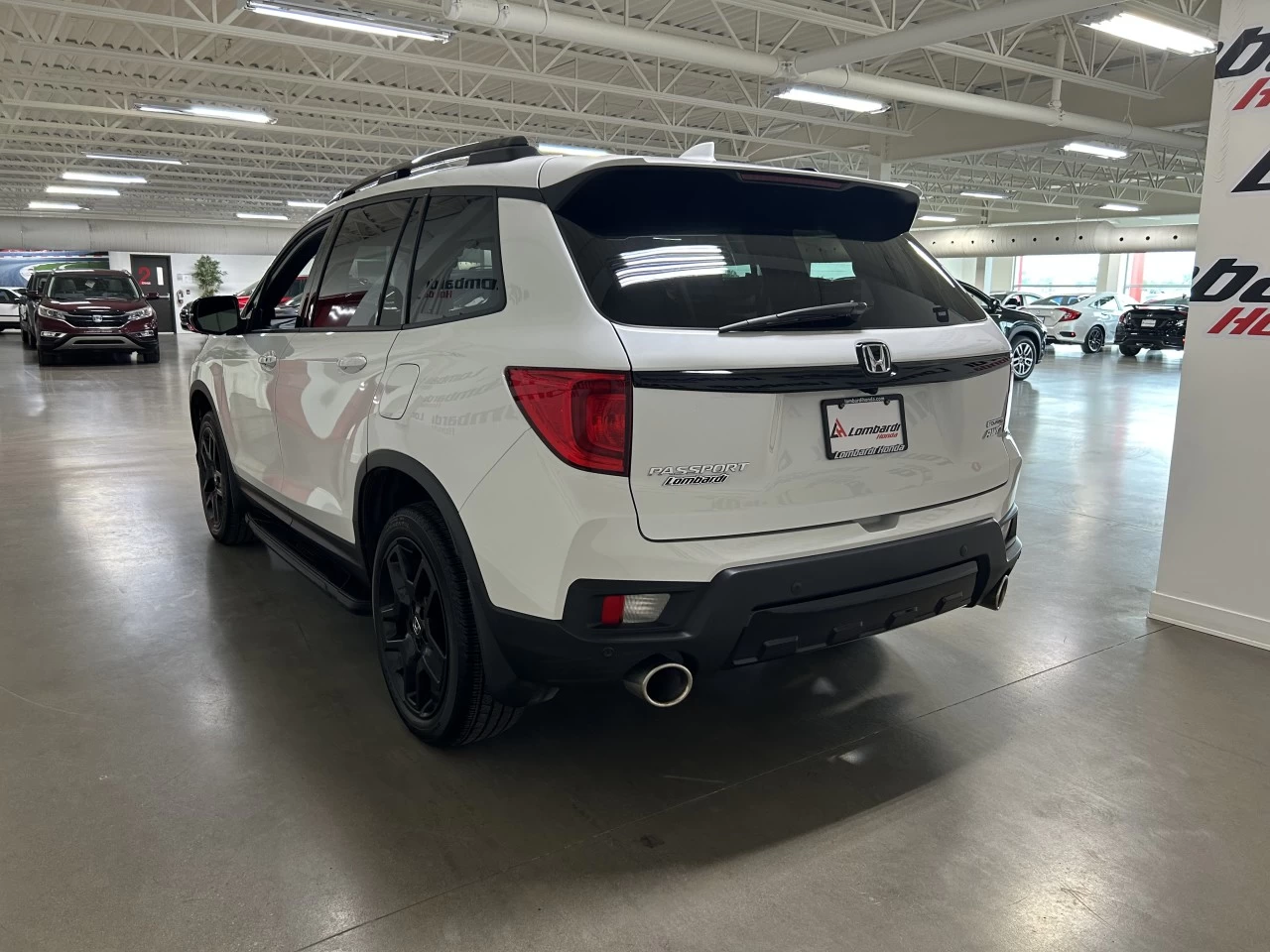 2022 Honda Passport
                                                    Touring-V6-CUIR-MARCHEPIEDS Image principale