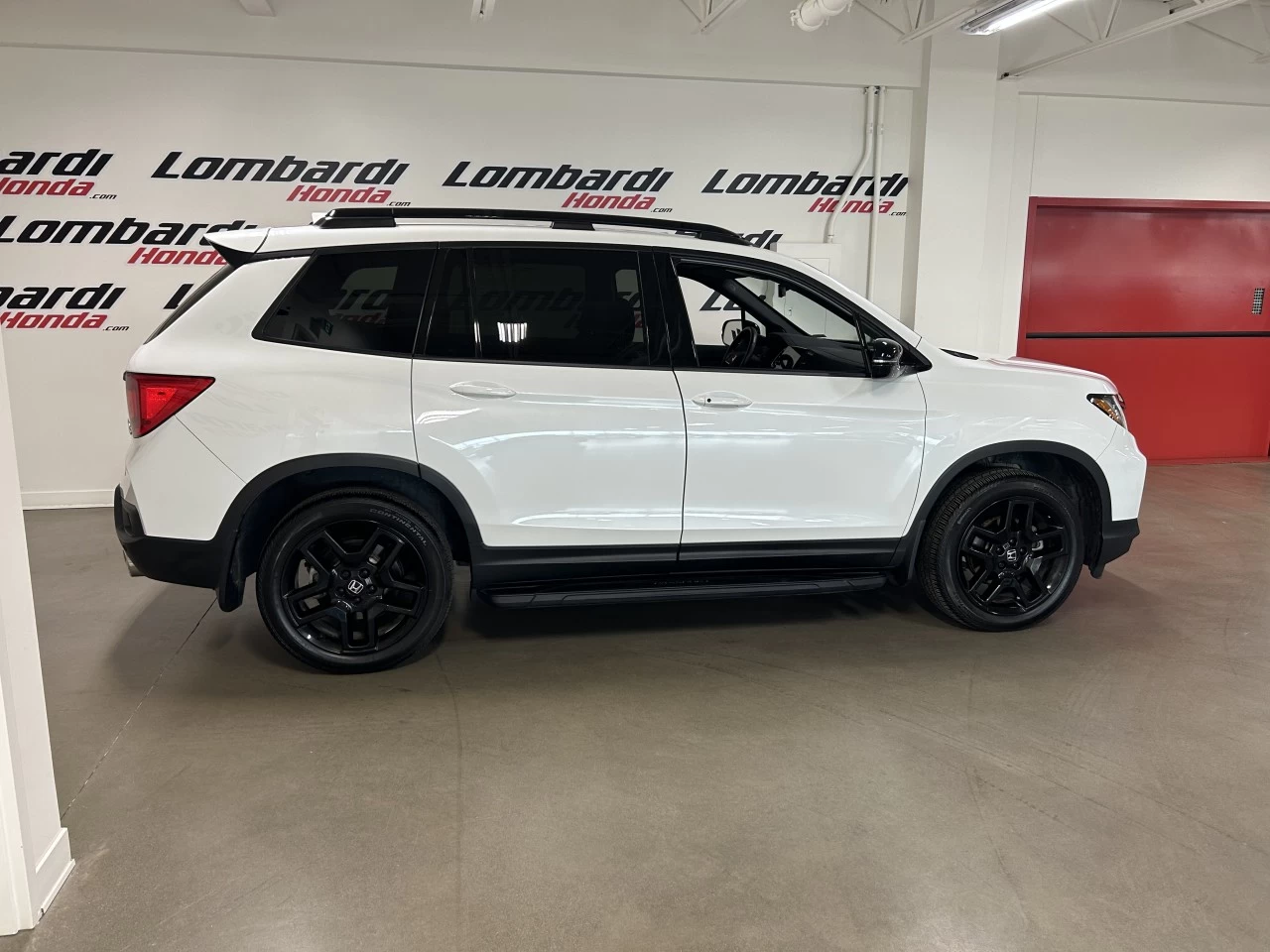 2022 Honda Passport
                                                    Touring-V6-CUIR-MARCHEPIEDS Image principale