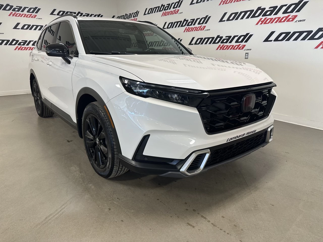 2023 Honda CR-V Touring https://www.lombardihonda.com/resize/b990ff35b810a3abc0cc817b2ca24889-1