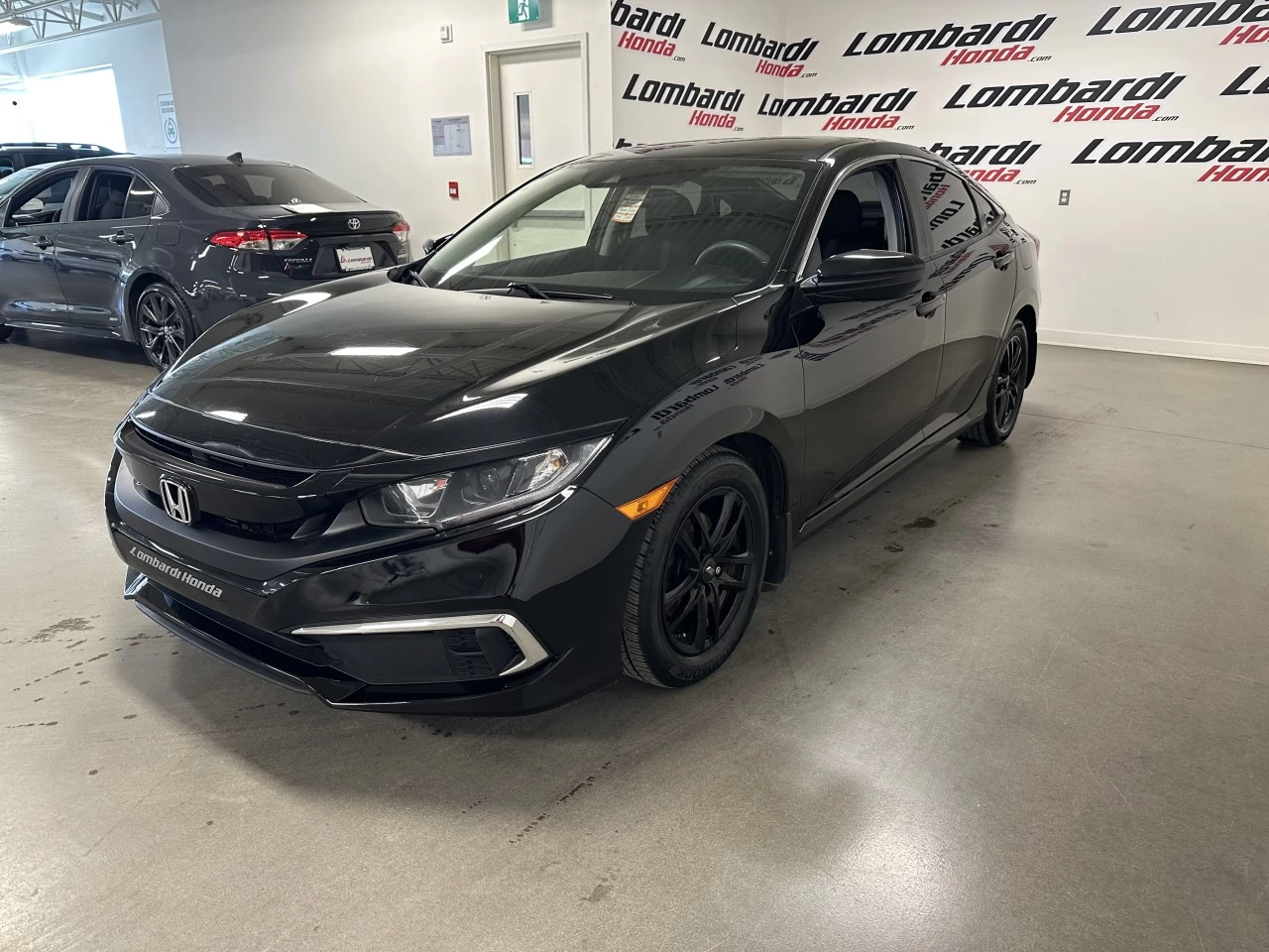 2020 Honda Civic LX https://www.lombardihonda.com/resize/b990ff35b810a3abc0cc817b2ca24889-1