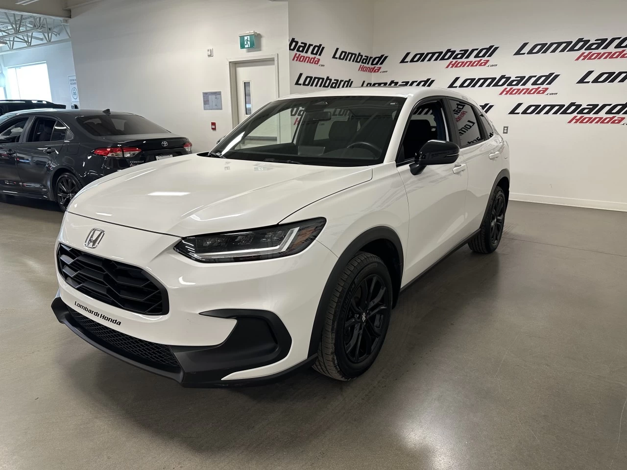2023 Honda HR-V Sport https://www.lombardihonda.com/resize/b990ff35b810a3abc0cc817b2ca24889-1