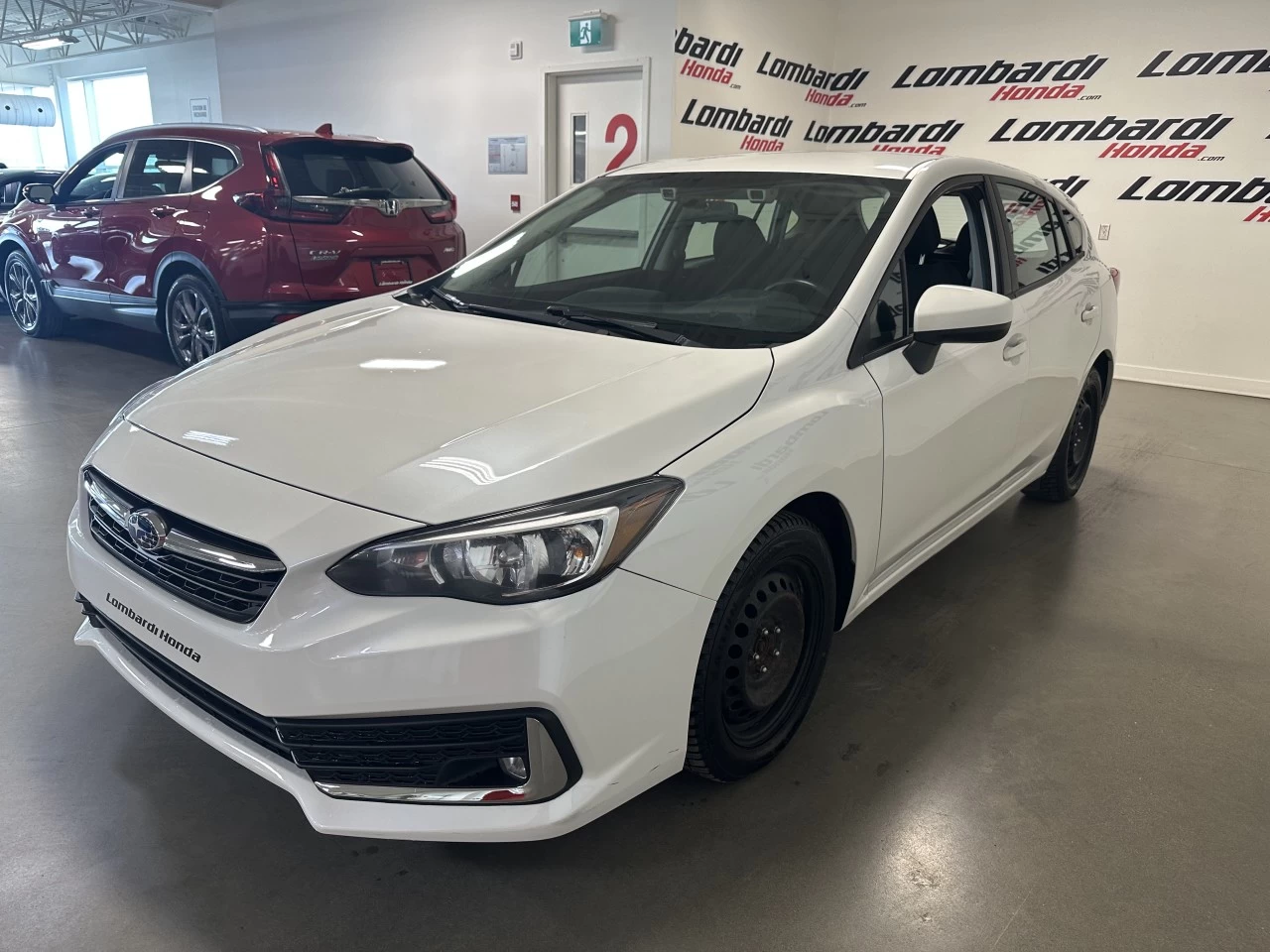 2022 Subaru Impreza
                                                    Touring Image principale