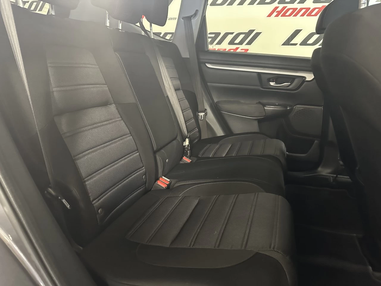 2020 Honda CR-V LX https://www.lombardihonda.com/resize/b990ff35b810a3abc0cc817b2ca24889-1