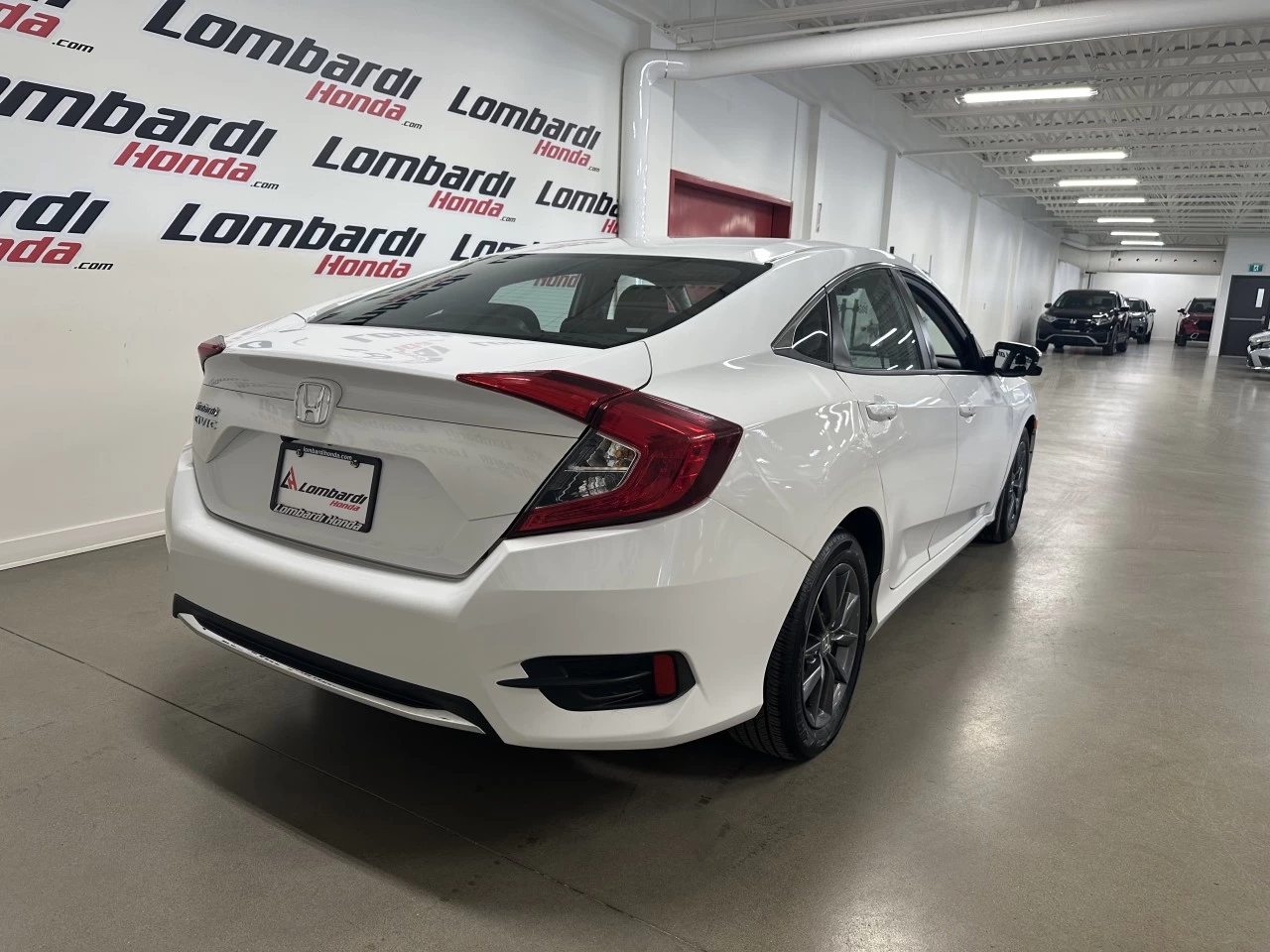 2021 Honda Civic EX https://www.lombardihonda.com/resize/b990ff35b810a3abc0cc817b2ca24889-1