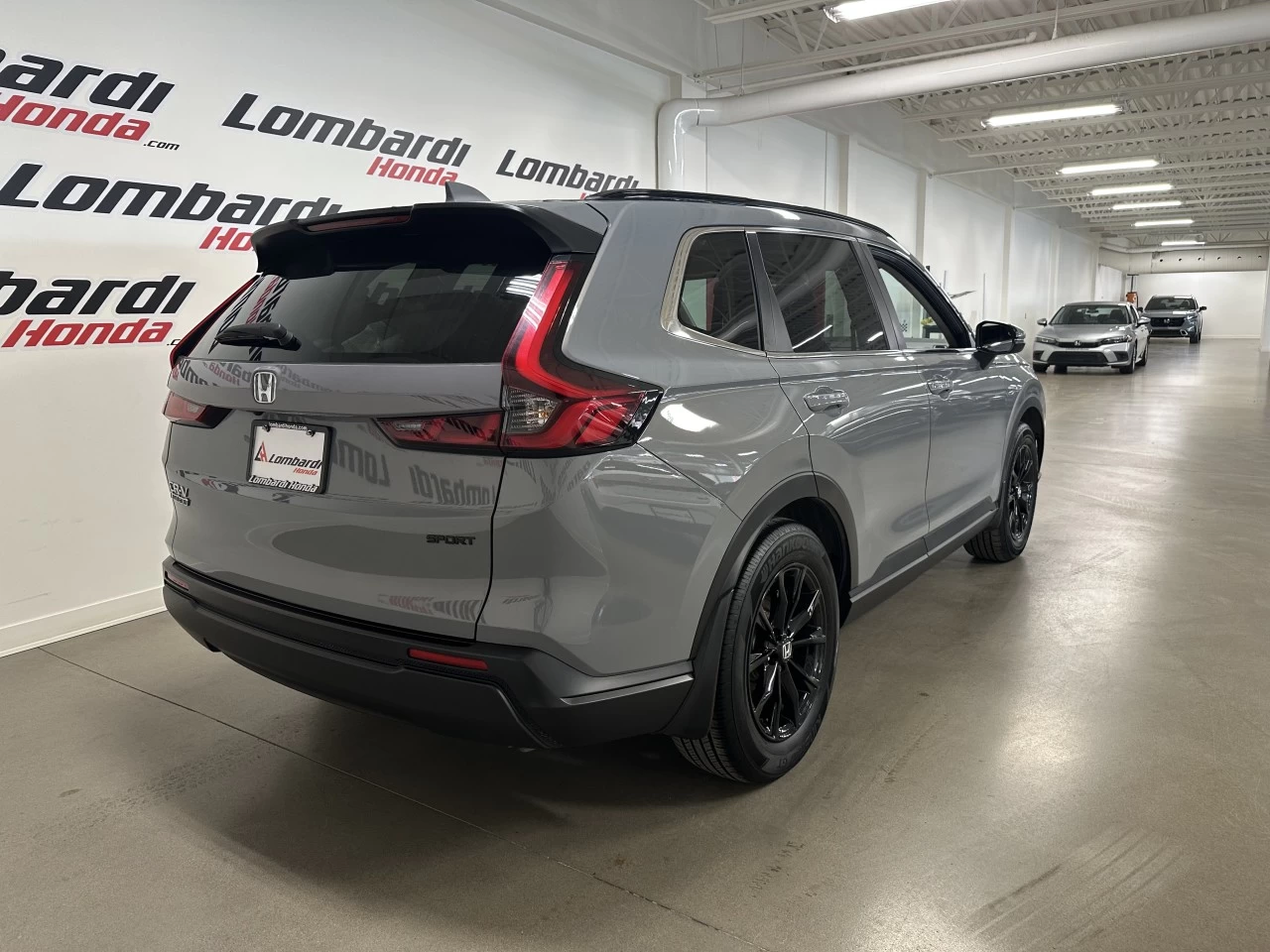 2023 Honda CR-V Sport https://www.lombardihonda.com/resize/b990ff35b810a3abc0cc817b2ca24889-1