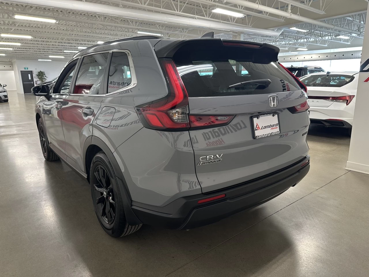 2023 Honda CR-V Sport https://www.lombardihonda.com/resize/b990ff35b810a3abc0cc817b2ca24889-1